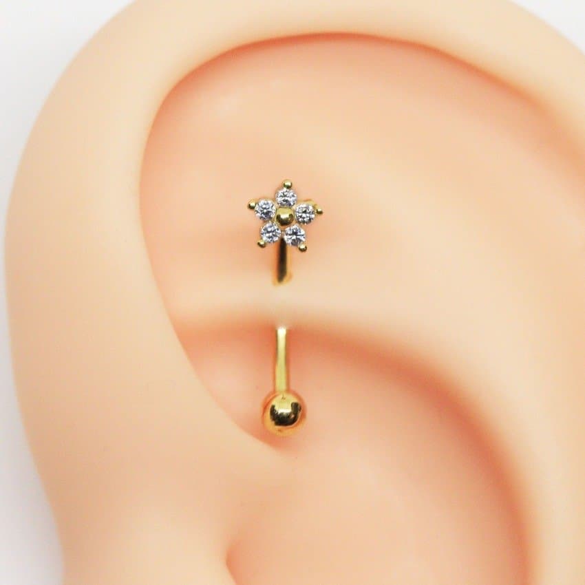 Piercing Rook Banana Flor Cravejada